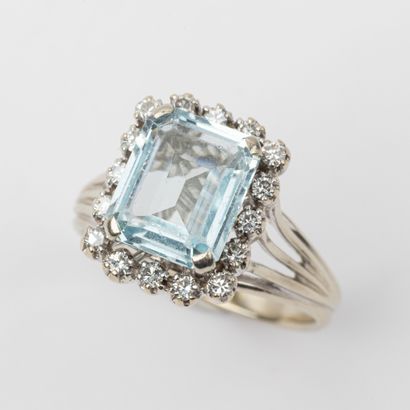 Aquamarine cocktail ring, surrounded by brilliant-cut...