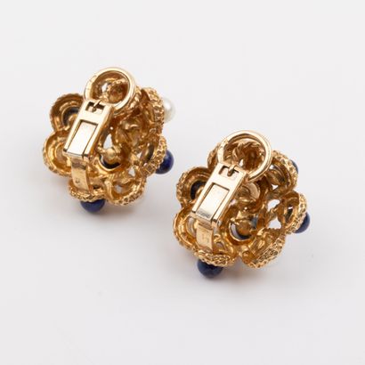 Pair of ear clips decorated with stylized...