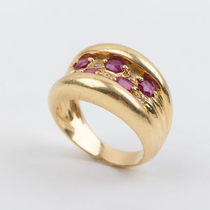 Band ring paved with rubies and 8/8-cut diamonds,...