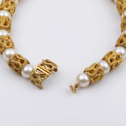 Semi-articulated bracelet, cultured pearls...