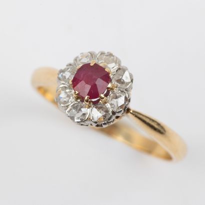 Ruby daisy ring, surrounded by rose-cut diamonds;...