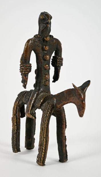 Statuette depicting the god Harpocrates seated,...