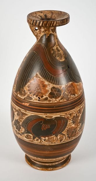 Flat-bottomed alabastron decorated with two...