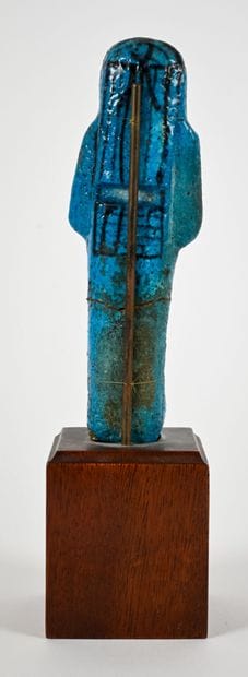 Mummy-shaped ushabti whose body is painted...