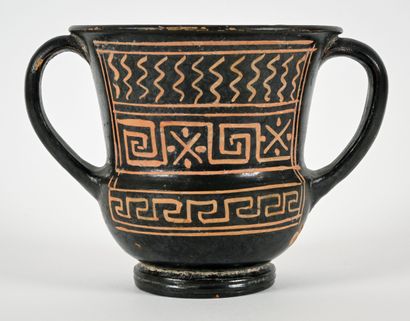Decorated kantharos with a painted design...