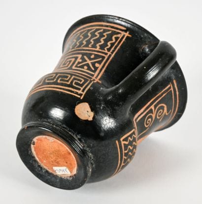 Decorated kantharos with a painted design...
