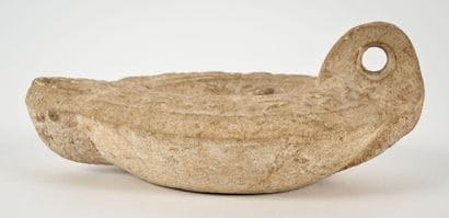 Oil lamp with a tondo decorated with a lion...