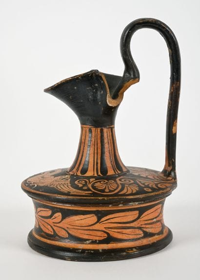 Red-figure epichysis, in the Apulian style...