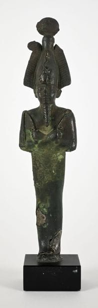 Statuette depicting the god Osiris in mummy...