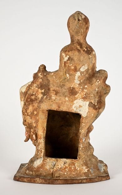 Statuette depicting a draped young woman...