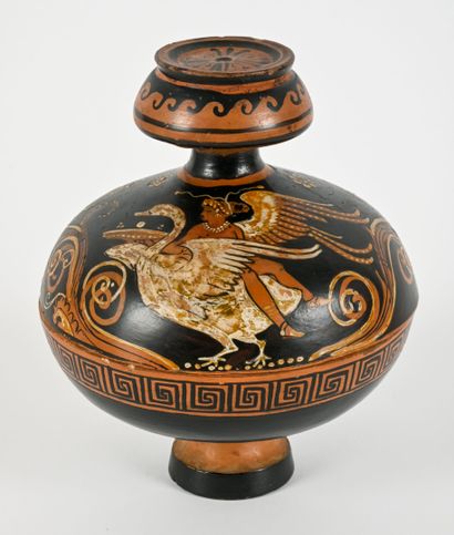 A globular pyxis whose lid is decorated with...