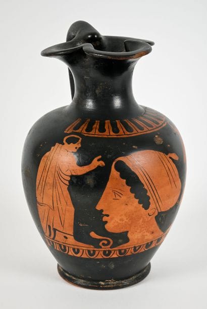 Red-figure oenochoe decorated with a female...