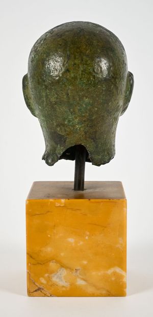 Head depicting the portrait of a priest with...