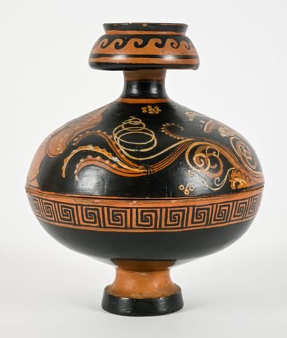 A globular pyxis whose lid is decorated with...