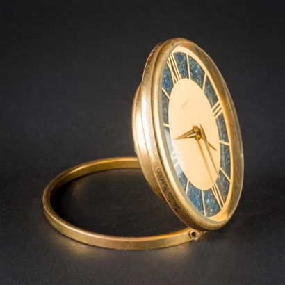 BREGUET
Réveil de voyage en métal doré, cadran...
