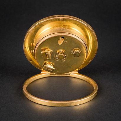 BREGUET
Réveil de voyage en métal doré, cadran...