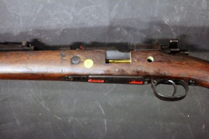 Coupe didactique d'un fusil système Mauser...