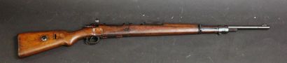 Coupe didactique d'un fusil système Mauser...