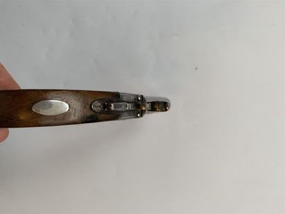 Pistolet à coffre et percussion marqué 