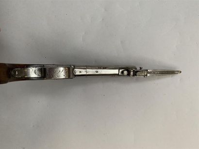 Pistolet à coffre et percussion marqué 