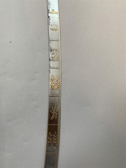 Sabre à la mameluk, fusée en bronze monobloc...