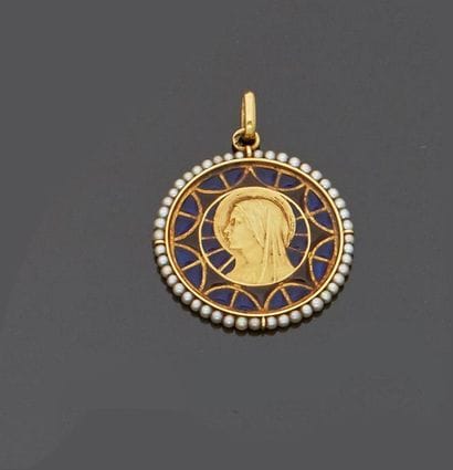 Medal in 18 k (750 thousandths) yellow gold...