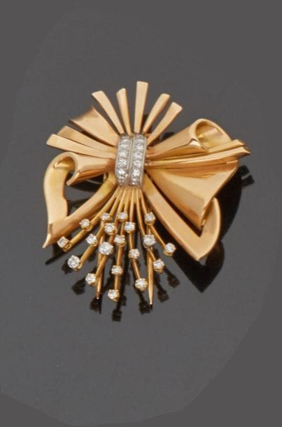 18 k (750 thousandths) yellow gold bow clip...