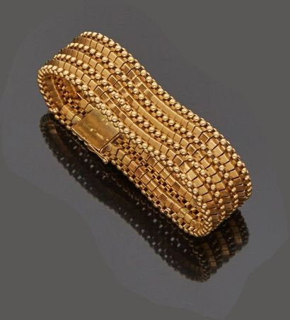 Articulated bracelet in 18 k (750 thousandths)...