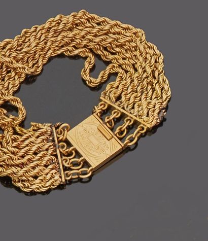 Bracelet decorated with seven 18 k (750 thousandths)...