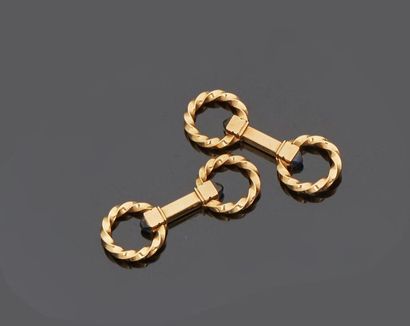 Pair of metal cufflinks with retractable...