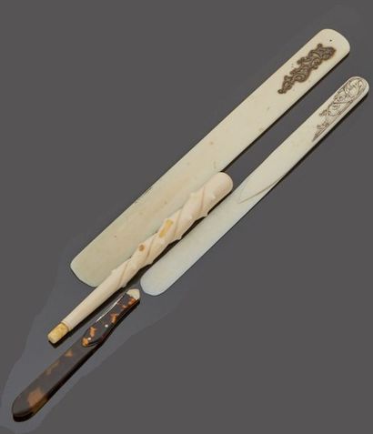 Three letter openers, two of which are made...