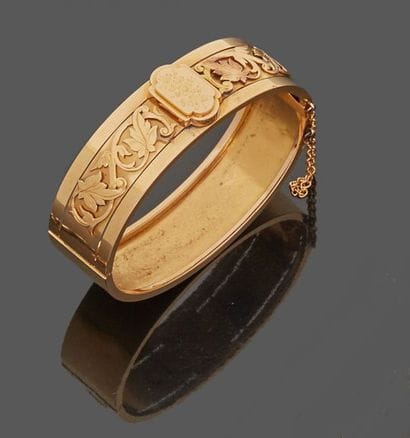 Rigid bracelet in 18 k (750 thousandths)...