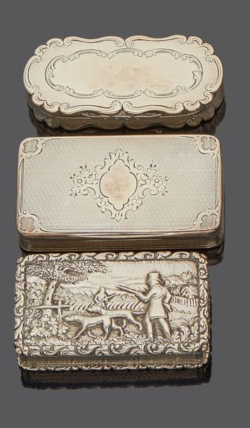 Three silver pill boxes, one decorated with...