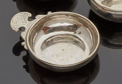 DINAN

Silver wine cup with a cut-out handle,...
