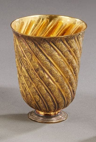 PUIFORCAT



A cup on a vermeil pedestal,...