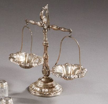 Salt cellar in the shape of a silver scale...