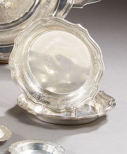 CHRISTOFLE

Pair of silver bottle mats model...