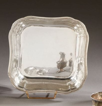Silver vegetable dish with scrolled edges,...