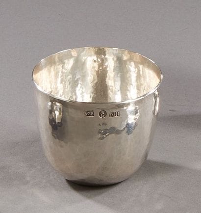 Large and heavy hammered silver curon.

Work...