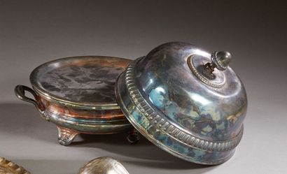 A stove and a bell made of silver plated...