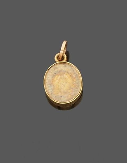 Small miraculous medal in 18 k (750 thousandths)...