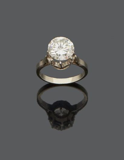 Solitaire ring in 18 k (750 thousandths)...