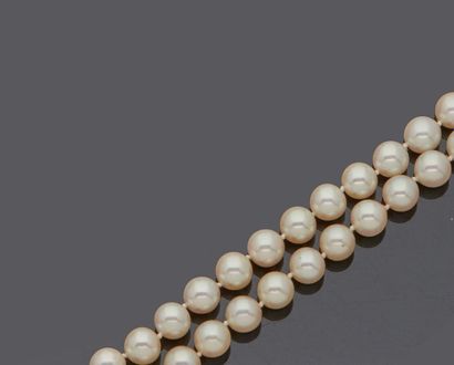 Two cultured pearl necklaces, one of which...