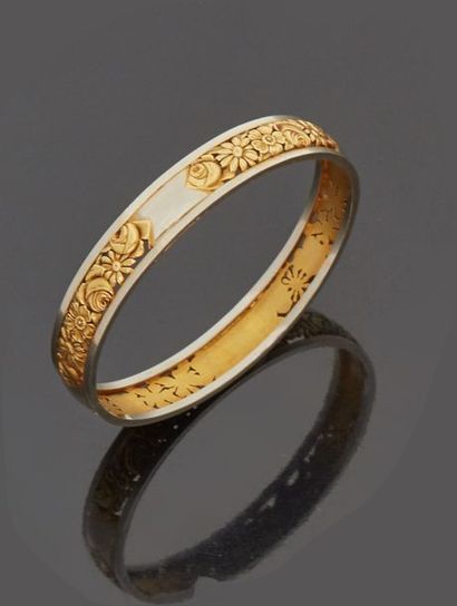 Rigid bracelet in 18 k (750 thousandths)...