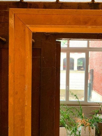 Gilded wooden frame with moulded flat grooves...