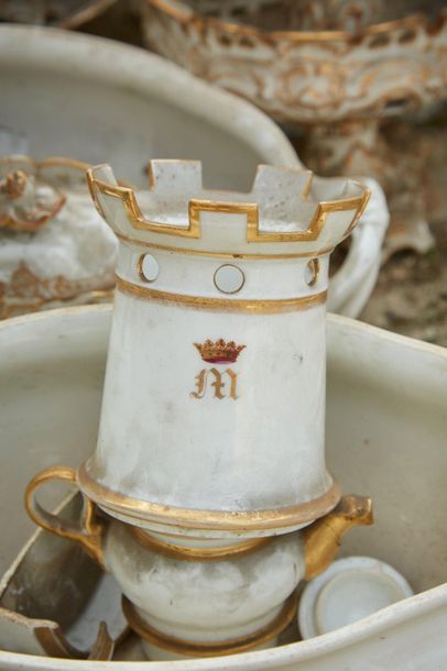 White porcelain service part with gilded...