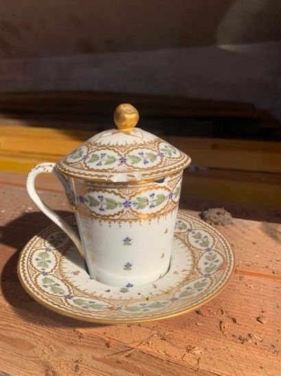 Seven small covered earthenware pots with...