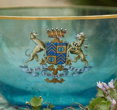 Cup in blue tinted glass with golden rim...