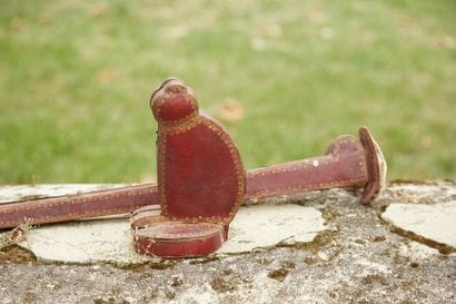 Red morocco sword case decorated with small...