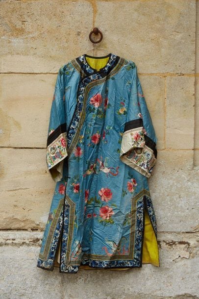 Blue silk kimono embroidered with peony flowers...